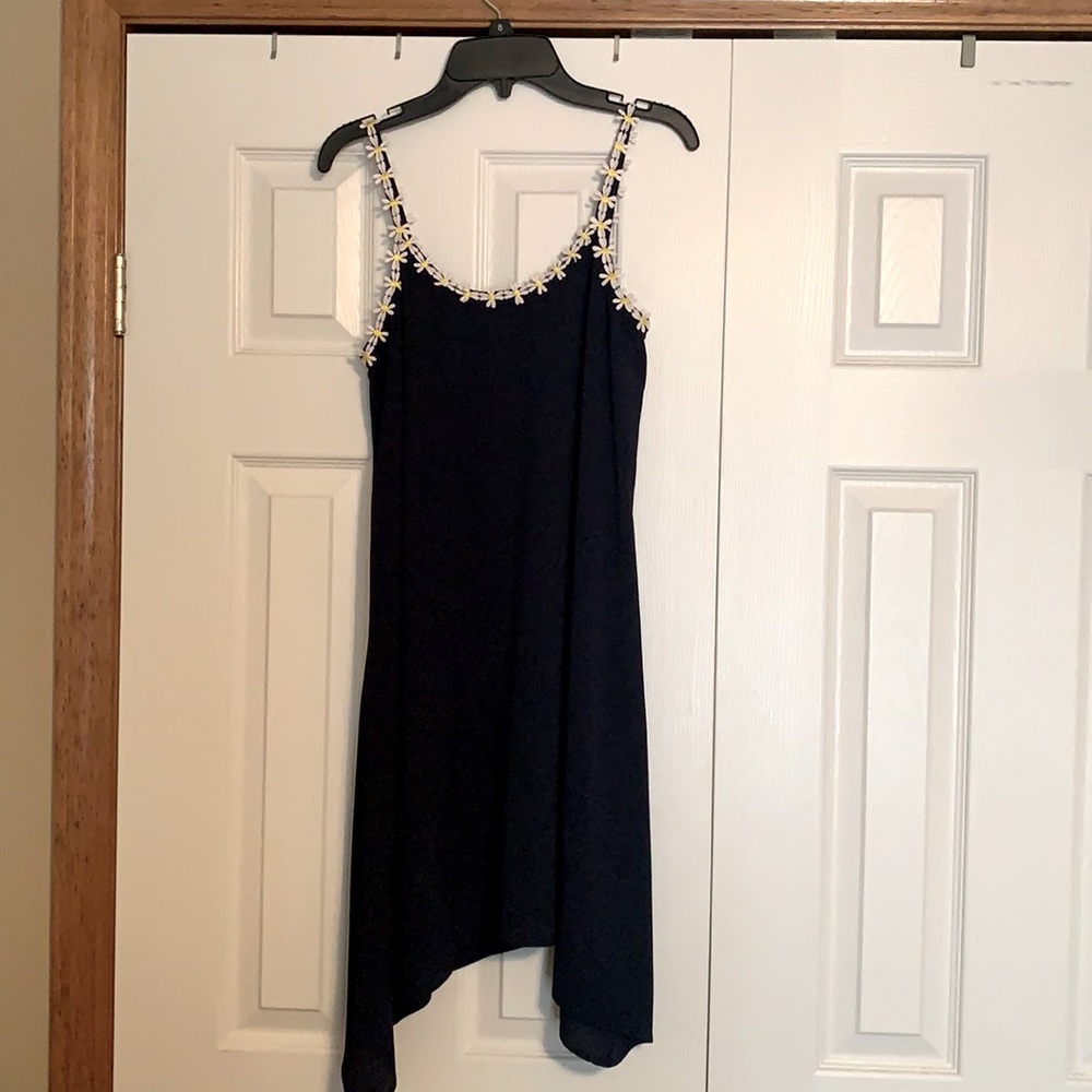 Navy blue and sunflower strapped dress.